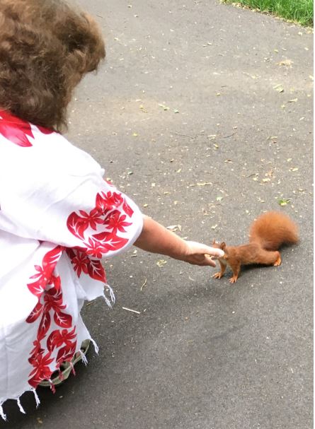 PragyaFeedingSquirel_w1.JPG
